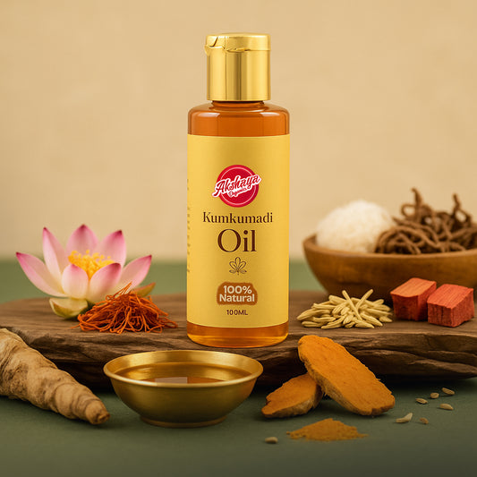 Bottle of Kumkumadi Oil with natural ingredients on a wooden surface